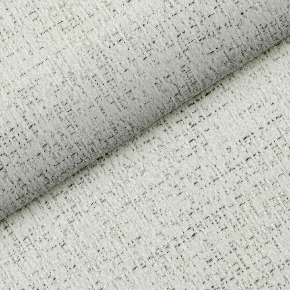 Biała tkanina Luna 02 Fargotex nadaje się idealnie na narożniki, kanapy, fotele czy krzesła. Posiada właściwości łatwo czyszczące.