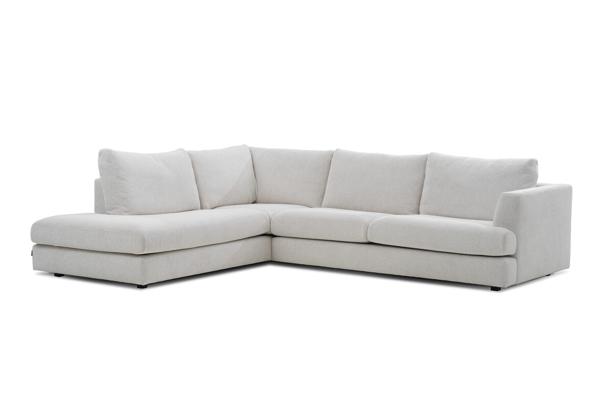 Jasna sofa narożna z szezlongiem w nowoczesnym stylu, minimalistyczna sofa tapicerowana w neutralnym odcieniu