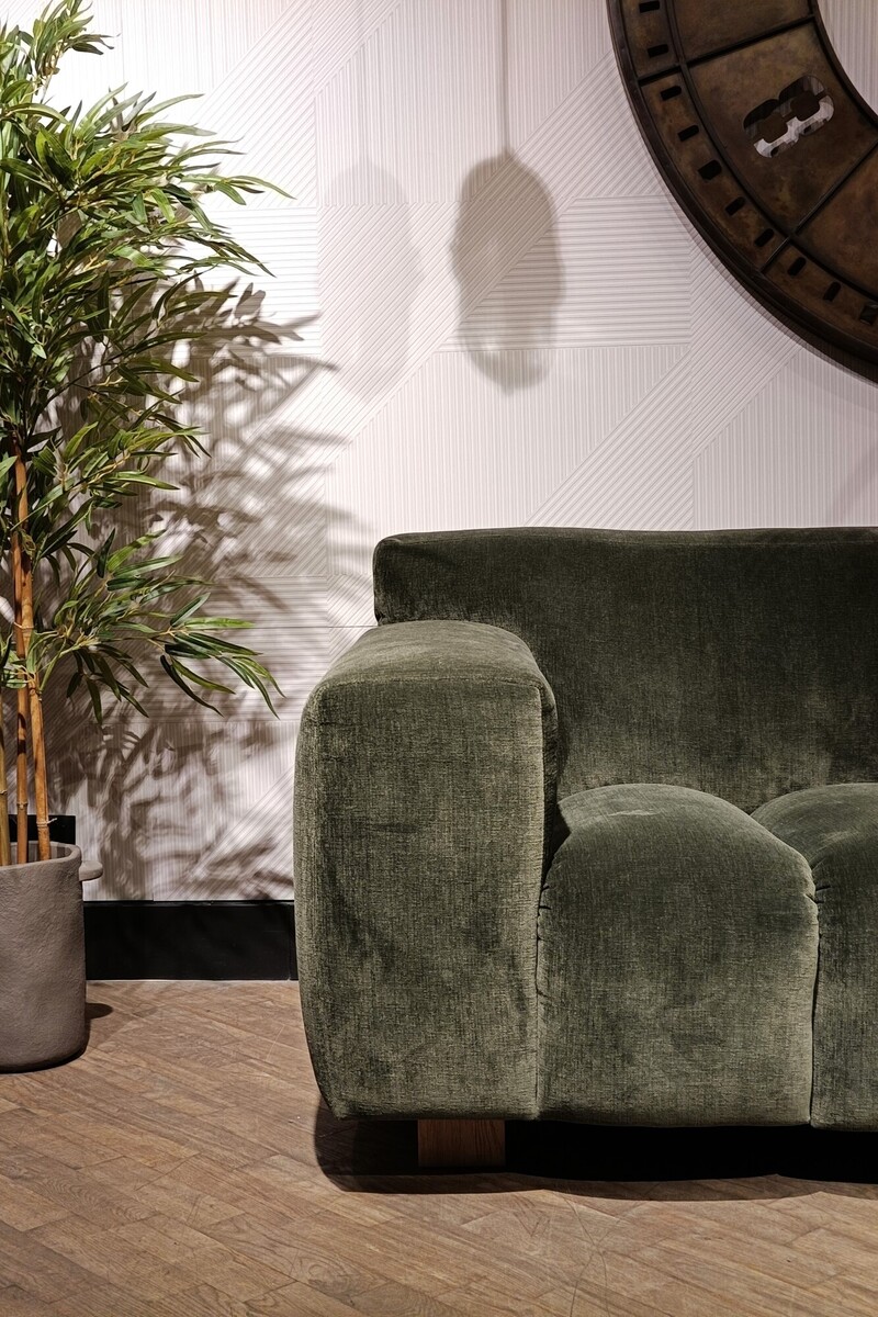  Vesta Quilt Inne Meble Katowice, zielona sofa na tle beżowej ściany, narożniki modułowe, roździeń meble