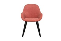 Brzoskwiniowo-różowe krzesło z czarnymi drewnianymi nogami